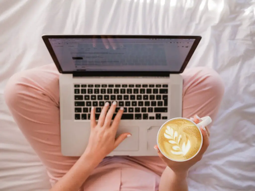 Working on a new midlife blog in bed with a cup of coffee