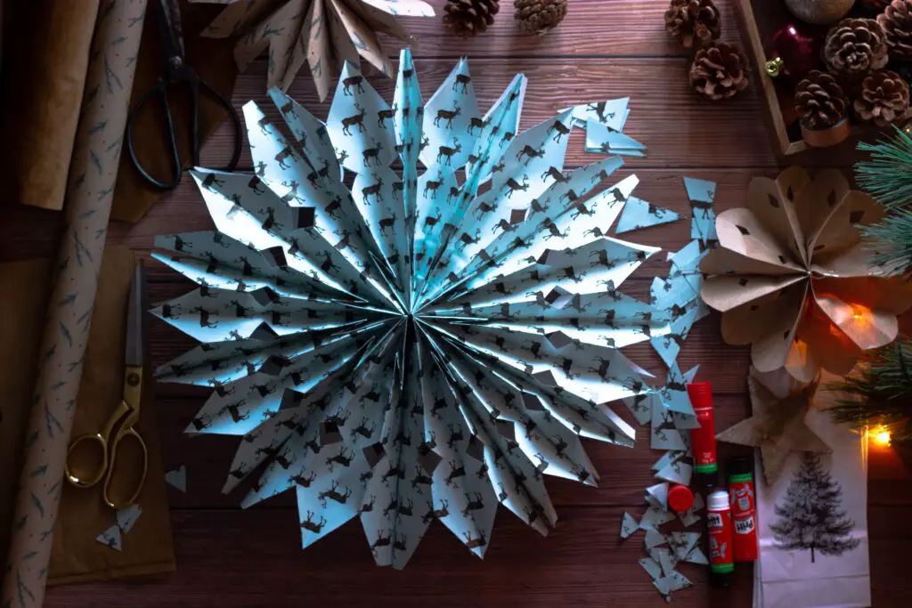 snowflake craft as example of holiday hacks for busy moms